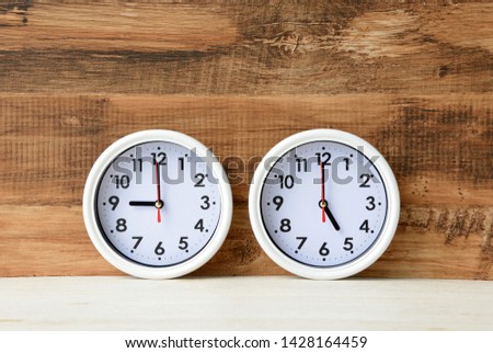 Business concepts, clock indicating working time Royalty-Free Stock Photo #1428164459