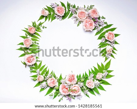 Wedding Round frame of flowers: rose, lilac, rowan leaves on a white background. Floral pattern. Copy space for text