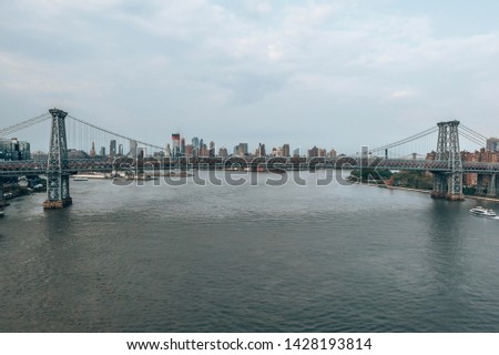 Bridge over Hudson river in New York, near Manhattan, USA. Aerial view from the helicopter.