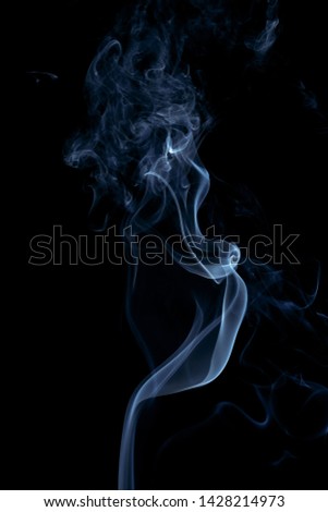 Colorful smoke on dark background
