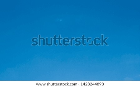 Minimalist Airplane in a Blue Sky