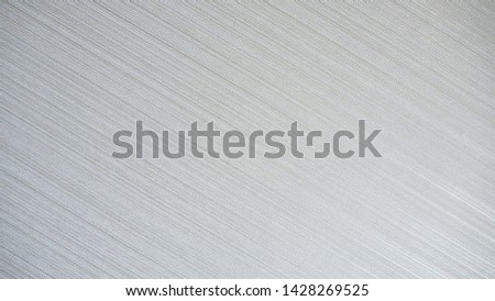 Closeup of glossy wooden wall in black and white or grey tone for texture with diagonal lines and background. Cool banner on ad, web, page, and presentation. Monochrome modern seamless pattern