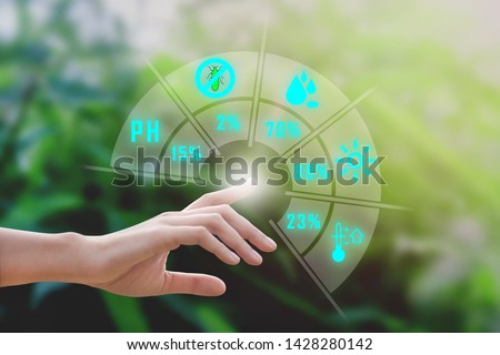 Business woman hand with Smart farming with IoT, futuristic ai agriculture technology concept. Data analysis, water, humidity, soil pH and insect Monitering, Ecology reuse and environmental logo.