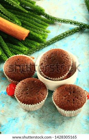 Vegan snack concept backgrounds- fresh baked cup cakes on a wooden table, 