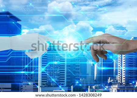 Robot and human hands with touching on city background, Artificial Intelligence and Technology ecology concept