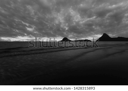 Sea, mountains, sky (black and white image)