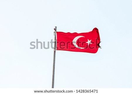 Turkish flag, waving flag of Turkey, close up, blue sky