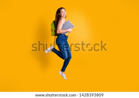 Full length body size view photo of cheerful lovely funny funky lady enjoy rejoice content dressed she her light-colored modern clothing sneakers isolated trendy white colorful yellow background