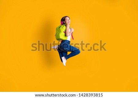 Full length body size view photo of charming lady feel energy rejoice she her have lesson school dressed white singlet top sneakers isolated yellow colorful background