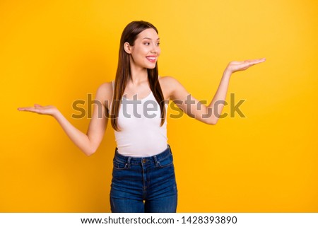 Portrait of cute nice charming lady have ads advertisements compare measure demonstrate dressed fashionable clothes isolated bright colorful background