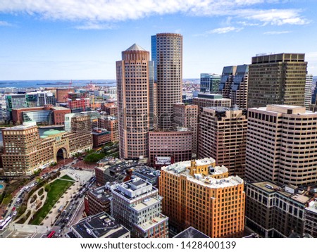 Aerial View of Downtown Boston (Financial District Skyline), Boston Harbor, and Expansive Urban Waterfront - Boston, Massachusetts, USA