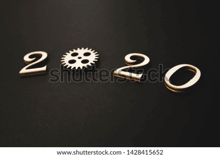 2020 year arrangements on a black background. industry concept