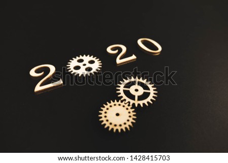 2020 year arrangements on a black background. industry concept