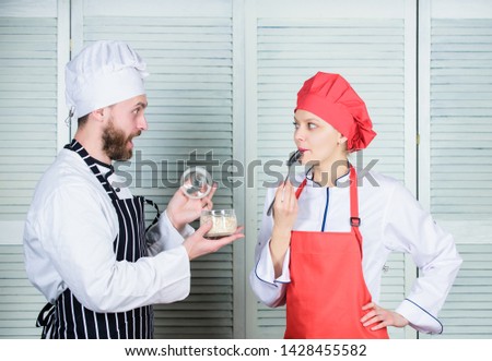 prepare dinner for family. Menu planning. culinary cuisine. Family cooking in kitchen. man and woman chef in restaurant. couple in love with perfect food. secret ingredient by recipe. cook uniform.