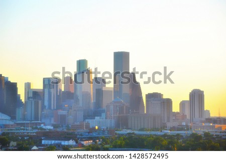 Downtown office buildings in Houston, Texas at sunset.