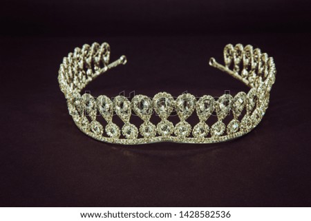 diamond crown for brides in close up on dark background,