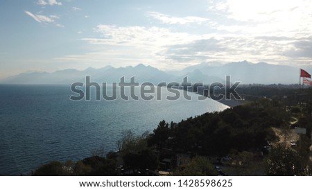 Antalya City and Beach with Turkey and Antalya Flags Aerial View
