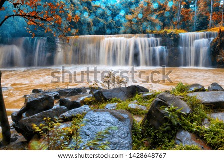 Photograph of beautiful waterfall in Thailand.
