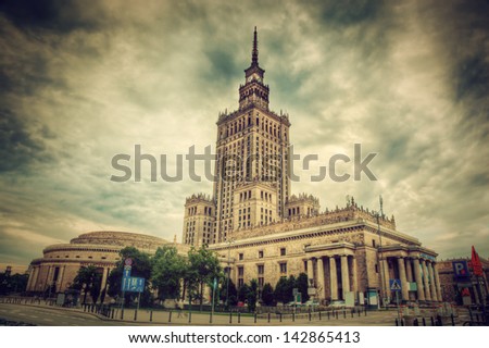 The Palace of Culture and Science, one of the symbols of Warsaw, Poland. Retro, vintage style. Palac Kultury i Nauki Royalty-Free Stock Photo #142865413