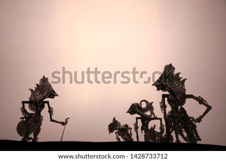In black and white, Wayang kulit or Shadow puppets typical of Java, Indonesia
