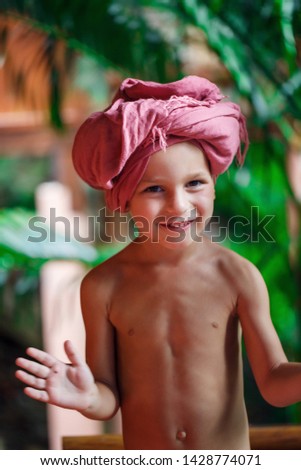 handsome boy with a scarf on his head in Thailand 