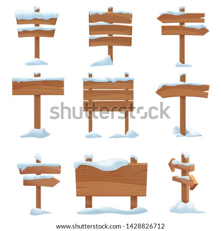 Cartoon wooden winter signs with snow caps set illustration.
