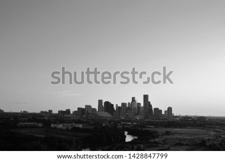 The downtown skyline of Houston at sunset.