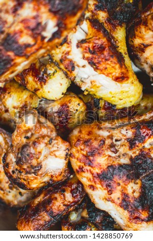 Close up picture of delicious outside grilled bbq chicken Brest, Grilled meat, fresh home made marinade, grilled on open flame grill. Healthy food for healthy mind.