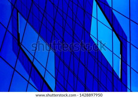 Double exposure photo of modern architecture fragment with glass wall, ceiling or roof made of checkered transparent panels. Structural glazing. Abstract geometric background with grid pattern.