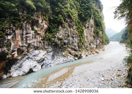 Beautiful blue green water of Liwu River running through narrow valley between rocky walls at Taroko national park, Hualien, Taiwan