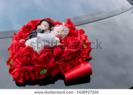 A doll bouquet used in Taiwan contemporary wedding customs for tied in front of the car.