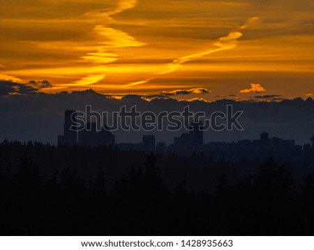 Seattle skyline view during sunset on sunny day.