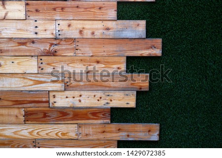 Old wood and grass texture background.top view of plank.