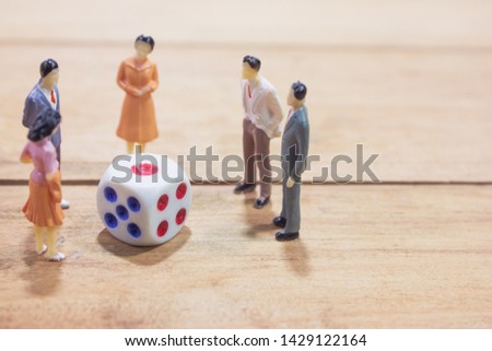 group of business people with dice on white background. fortune investment concept.