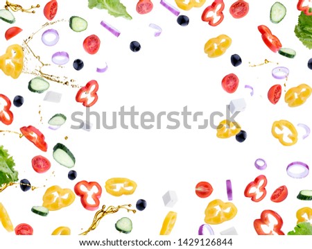 Fresh salad with flying vegetables ingredients isolated on a white background.Red tomatoes, pepper, cheese, lettuce, cucumber, olives and olive oil. Royalty-Free Stock Photo #1429126844