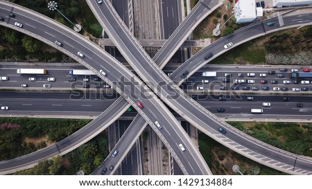 Aerial drone top view photo of highway multilevel junction interchange road in urban populated area Royalty-Free Stock Photo #1429134884