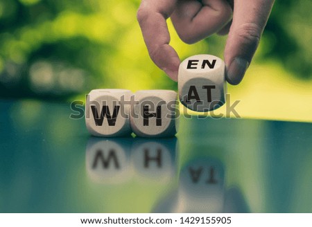 Hand turns a cube and changes the word "what" to "when".