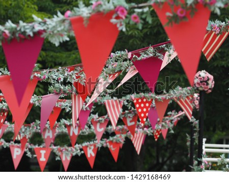 variety red flags, hanging in festival season