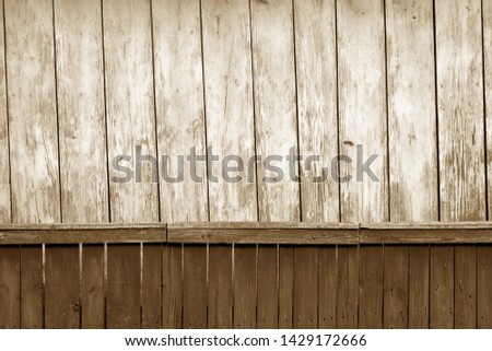 Old grunge wooden fence and wooden wall pattern in brown tone. Abstract background and texture for design.