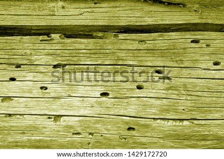 Wooden wall texture in yellow color. Abstract background and texture for design.