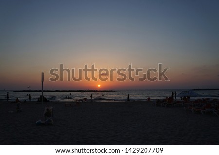 Sunset on the beach in Tel Aviv, Israel