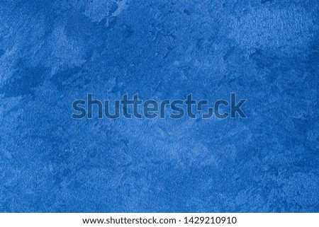 Texture of blue decorative plaster or concrete. Abstract stucco background for design. Art stylized banner with copy space for text.