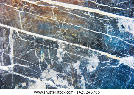 texture of multi-colored marble ceramics with patterns of stains and a cracks