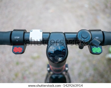Close up image of an e-scooter handlebar