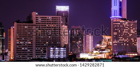 Business architecture, skyscrapers and light trails, Close shot of skyscrapers with lights, Night building.