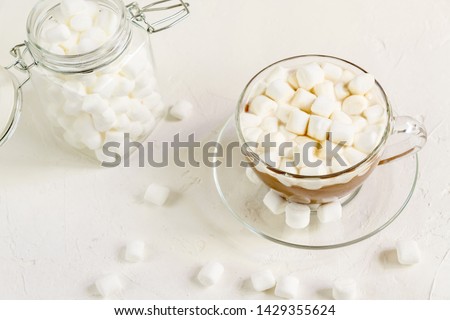 Close up of Cup of hot delicious cocoa drink with marshmallows.