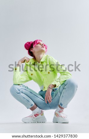 woman in green jacket squats fashion