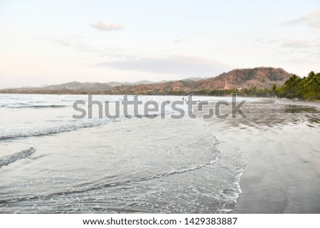 beach in winter, photo as a background , taken in Samara, Nicoya, Costa rica central america