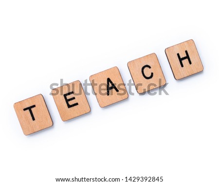 The word TEACH, spelt with wooden letter tiles over a white background.