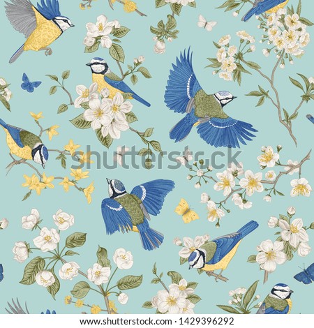 Seamless vector pattern with tits and blooming trees. Birds and flowers. Chinoiserie